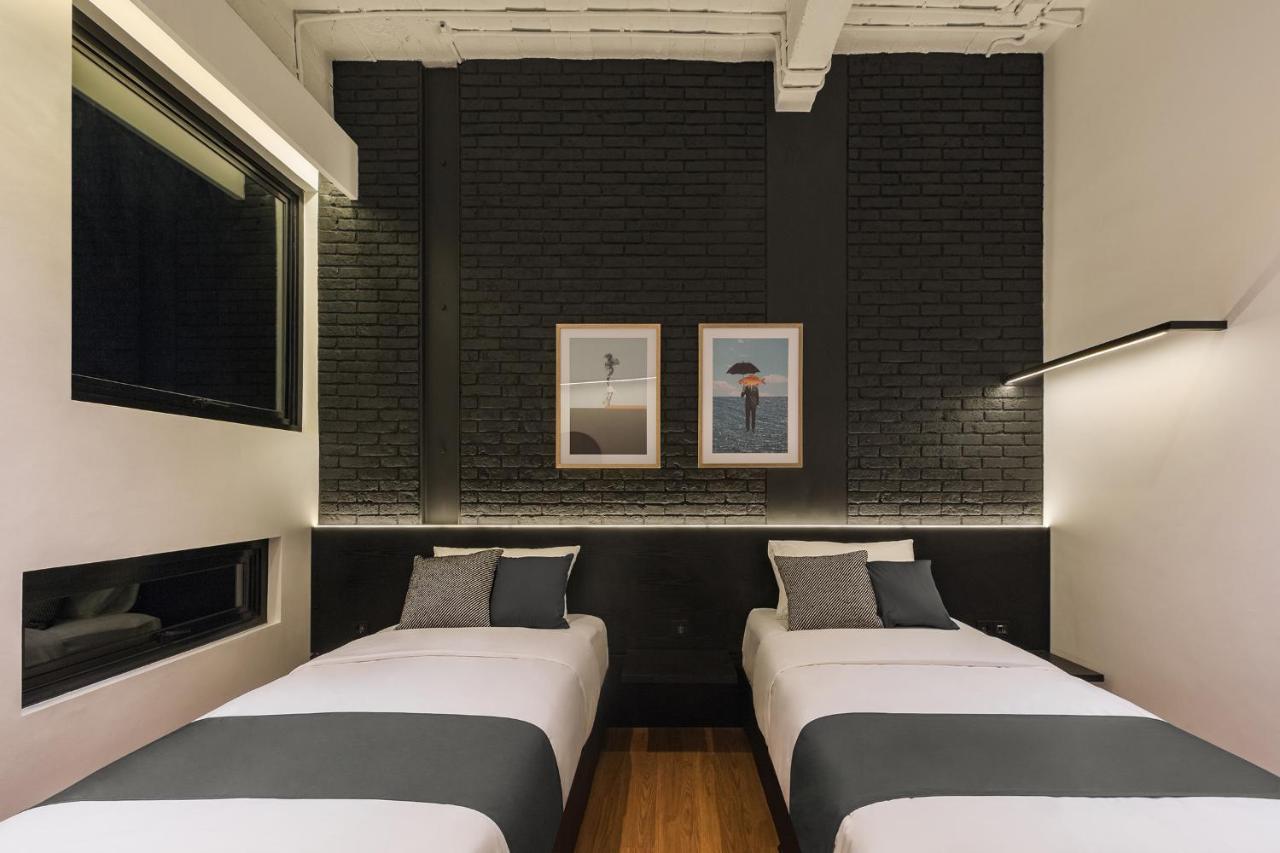 Qub Rooms Семаранг Екстер'єр фото