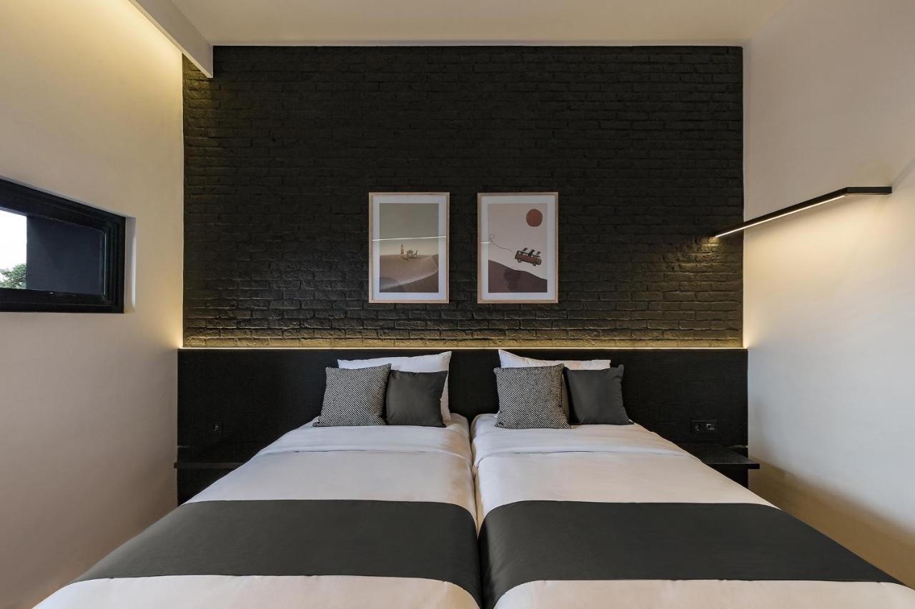 Qub Rooms Семаранг Екстер'єр фото